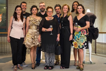 profesora alumno CEU invitados coctel firma moda