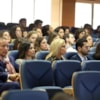 Participantes escuchando ponencia